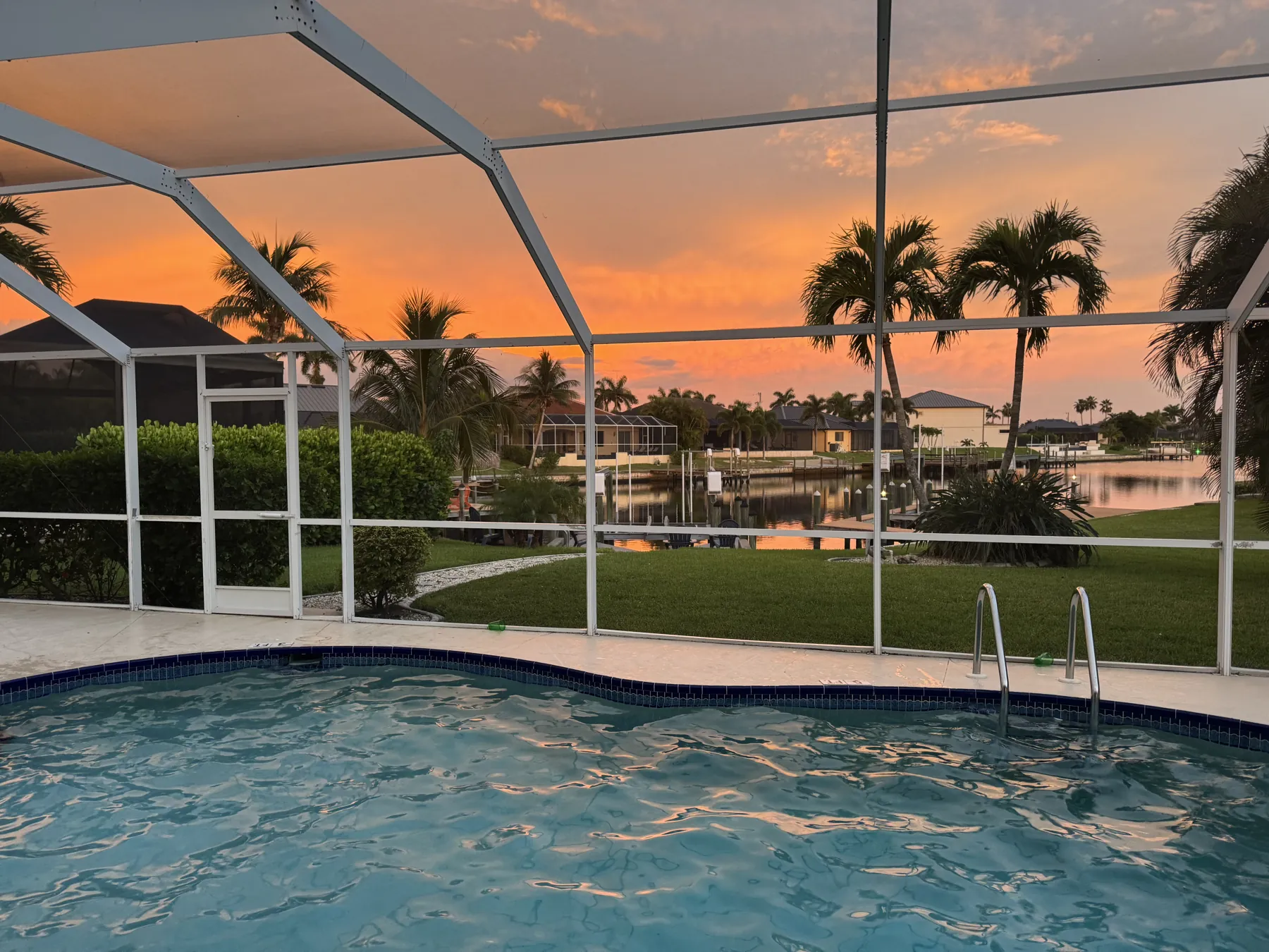 Pool and canal at sunset